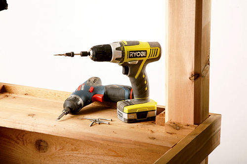 Pair of drill drivers for attaching fasteners