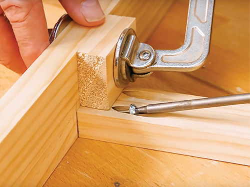 Adding pocket hole screws to pine entry bench subassembly