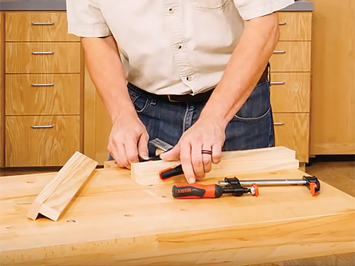 Clamping up entry bench leg assembly during glue-up