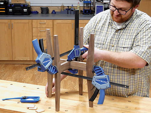 Clamping up parts of plant stand