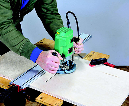 The slot you rout in the pullout support is for a stop screw that will keep the shelf sliding straight and prevent it from coming out of the cabinet.