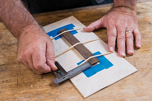Measuring lid handle on prairie box top