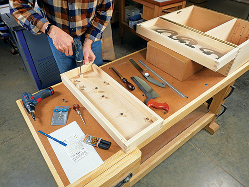 Drilling holes for door tool hangers