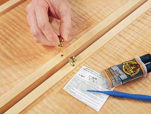 Installing knobs for tool cabinet doors