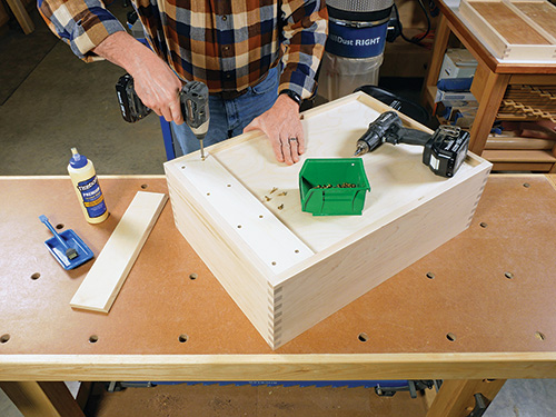 Attaching french cleat bar to back of tool cabinet for hanging