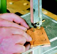 With a narrow blade, the Proxxon can cut tight curves in wood.