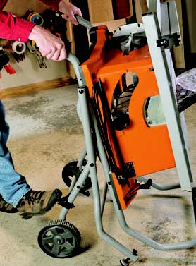 To set up or store RIDGID’s rolling base, step on a foot release and pivot the handles up or down. The action is well-balanced and easy.