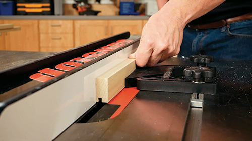 Cutting groove in cabinet door panel rail