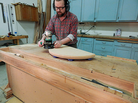 Trimming down edges of panel with router