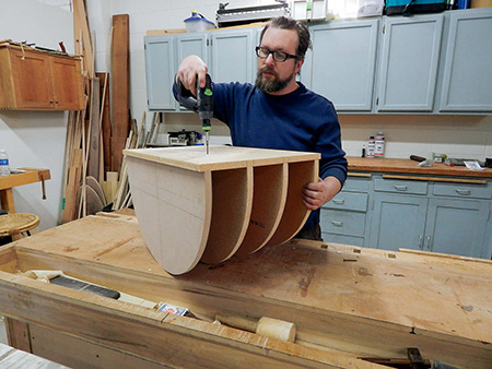 Installing shelving layers to vanity base