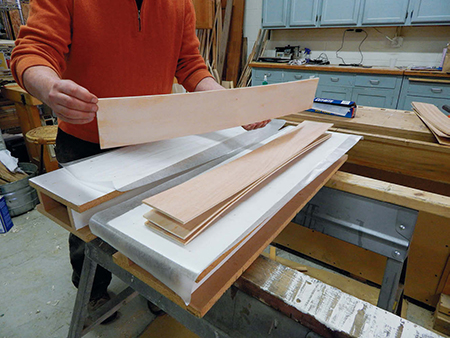 Creating lamination stack for vanity cabinet sides