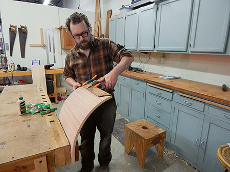 Adding veneer trim to cabinet door