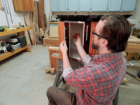Installing interior hardware to vanity cabinet carcass
