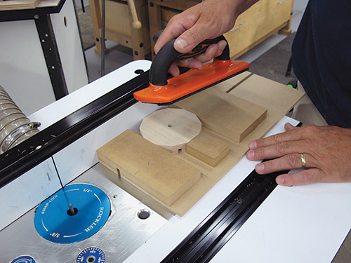 Setting up jig and push pad to set up clock face for cutting