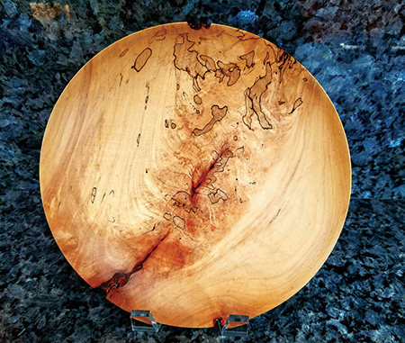 Turned platter with rough edges