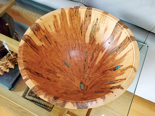 Interior of large, deep bowl turning