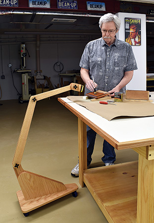 Using rolling task light to illuminate a finishing project