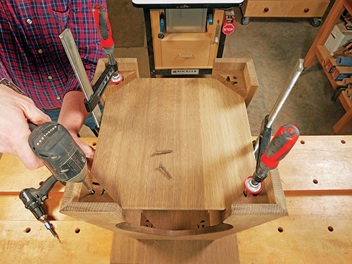 Installing shelf on underside of taboret table