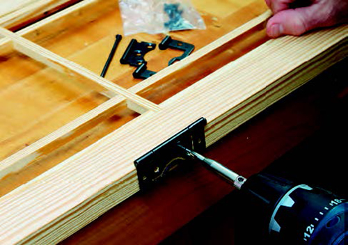 The screen hinges don't require mortising and they have removable pins, so they can be mounted on either the left or right side. Use a self-centering bit to ensure that the screw holes are perfectly centered. Remove the hinges before applying finish.
