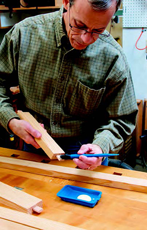 When assembling the frames, spread glue evenly inside the mortises and on the tenons. A silicone brush works well here and can be easily cleaned because glue won't adhere to it.