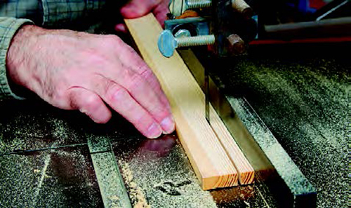 Next, with the band saw fence at the same setting, make the second cut. Use a planer to clean up the strips and mill them to exactly 3/8-inch square. You could also make the strips on a table saw, but there would be more waste, due to the wider saw blade kerf.