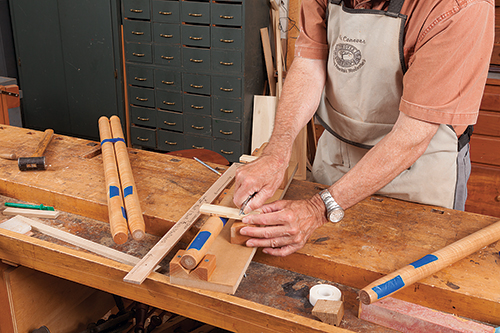 Marking chair leg joinery locations to drill holes for stretchers