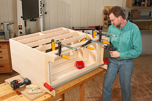 Fastening dresser base to the carcass.