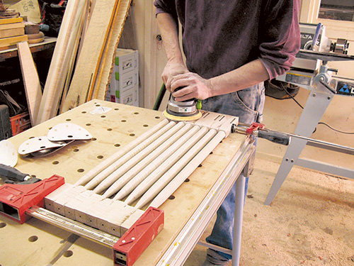 Sanding Shaker end table legs clamped together