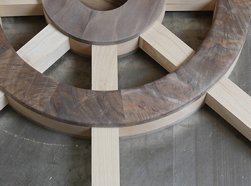 Test fitting spoke parts in ship wheel