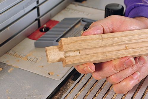 Close-up of groove cut into storage bench rail
