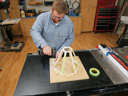 Installing lamp shade frame with installation jig