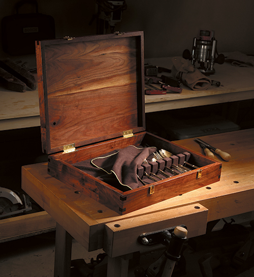 Silverware storage chest with cloth and storage slots