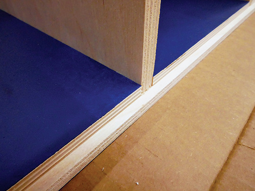 Close-up of simple bookcase part fit