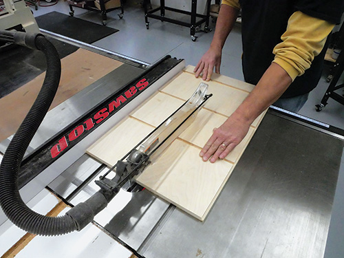 Cutting side panels from larger piece at table saw