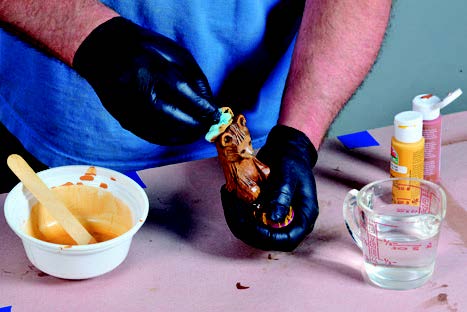 The author created a pigment stain from paint reduced with water, then brushed on and wiped off to get the color he wanted for this bear’s fur.