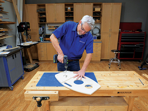 Attaching backing board to skee ball game board