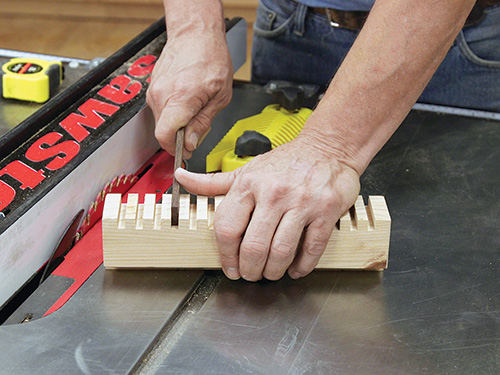 Test fitting slat pieces in trivet base