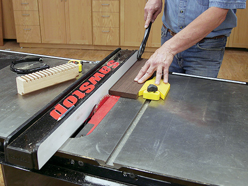 Lining up wenge board to cut several even trivet slats