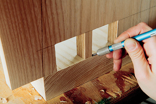 Scribe your lines for the tails directly off of the pins. This time-honored technique leaves less room for error. Use a marking knife or sharp pencil.