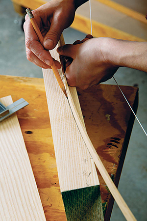 She also used the bow to form the seat’s top contour. It’s a simple and adjustable layout tool.