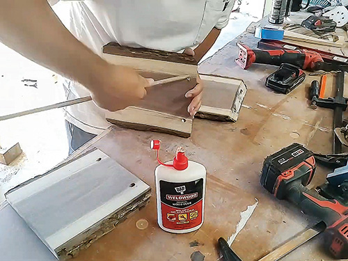 Filling dowel holes with glue for assembly