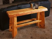 Table made with rough ash wood lumber