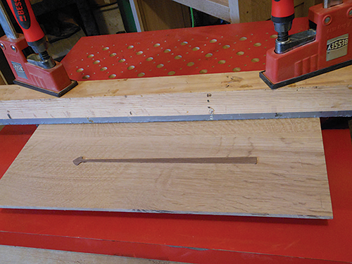 Pressing inlay in place during glue-up