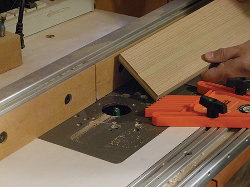 Routing drawer runner for bookcase drawer