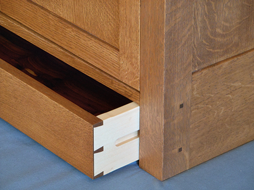 Contrasting unfinished drawer sides to finished exterior
