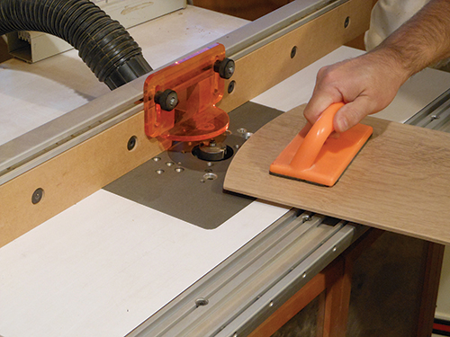 Routing end of bookcase side panel