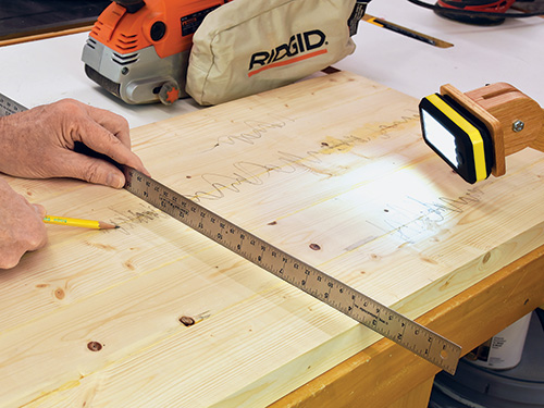 Using light and ruler to find uneven spots on a panel
