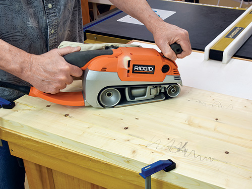 Using belt sander to flatten a large panel