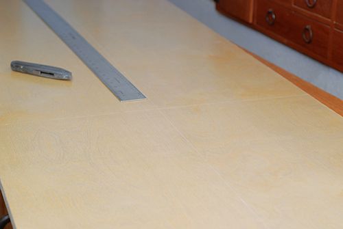 Marking stretcher locations on coffee table top