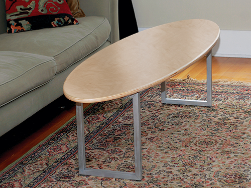 Surfboard-shaped coffee table assembled and placed in living room